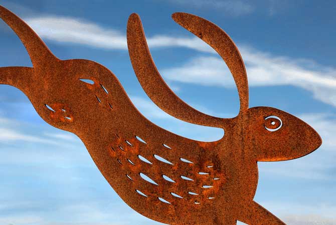 Rusted metal garden sculptures