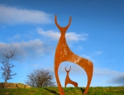 contemporary garden sculpture created from corten steel