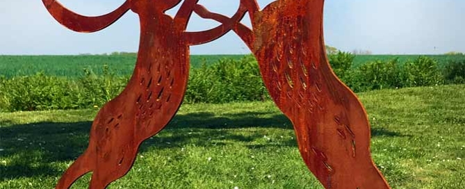 a new sculpture design for the garden, boxing hares made from corten steel